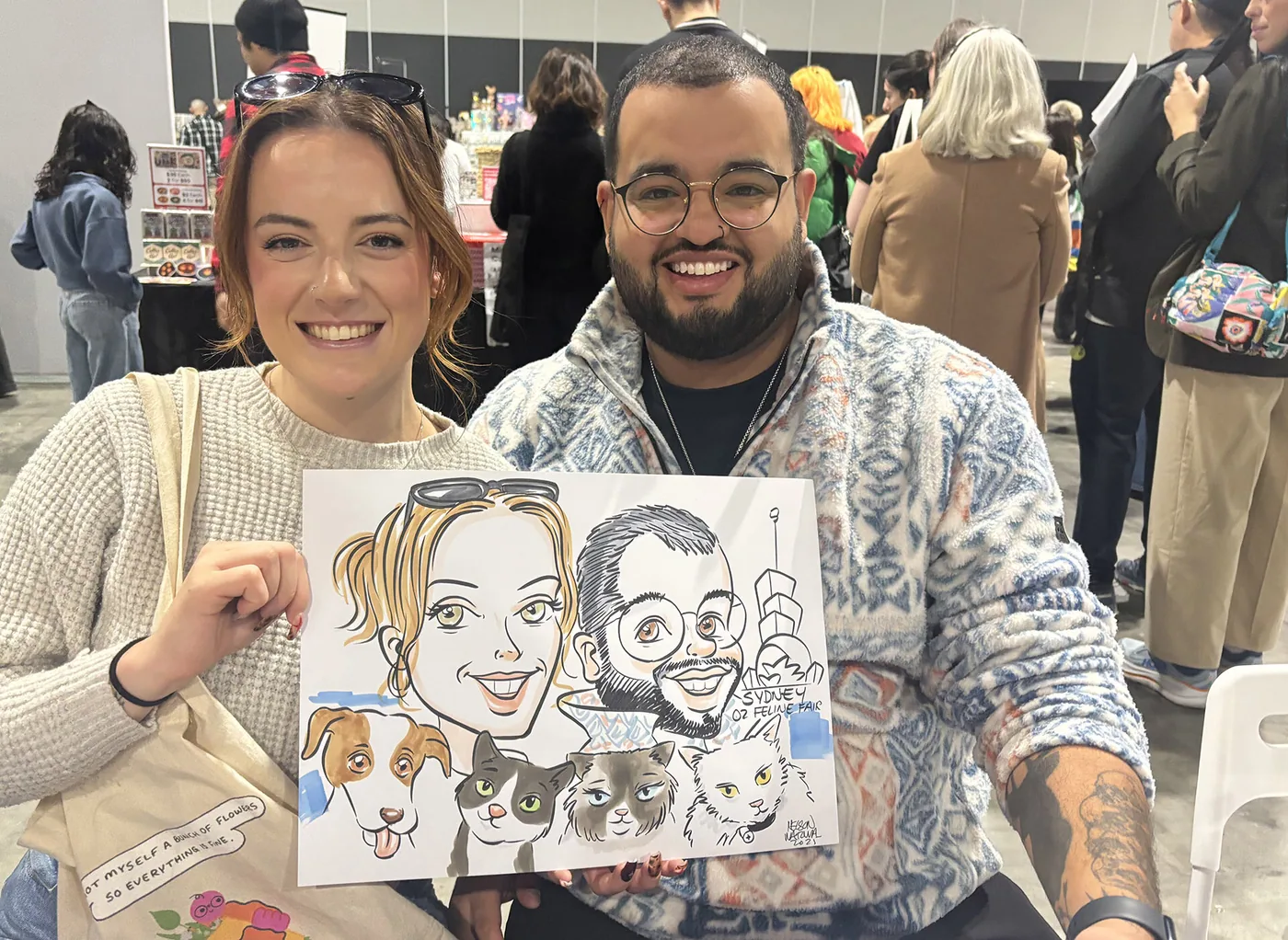 Person holding a hand-drawn caricature