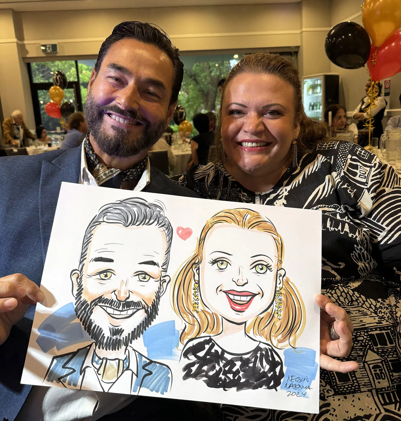 Person holding a hand-drawn caricature