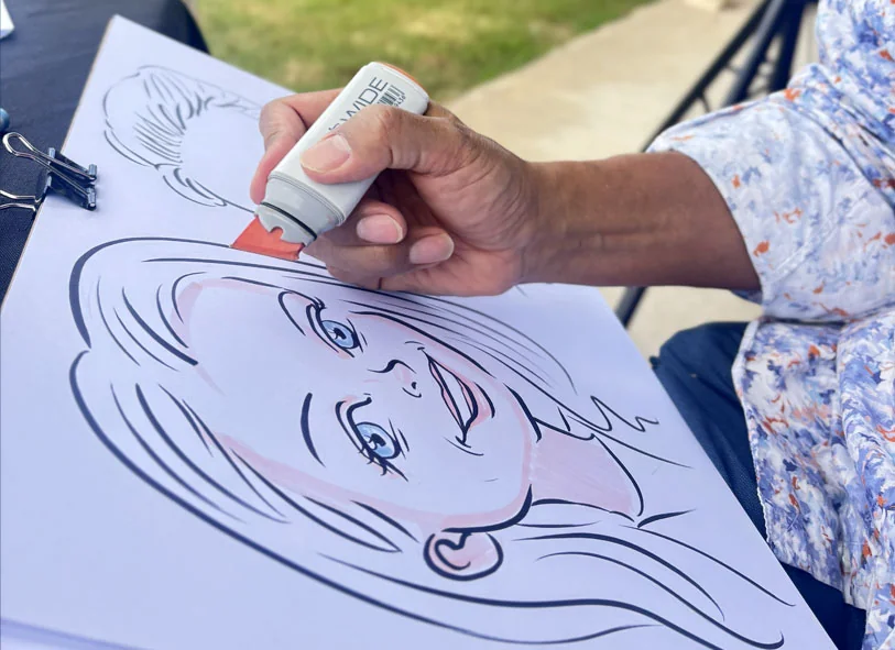 Nelson Matoma drawing a caricature live