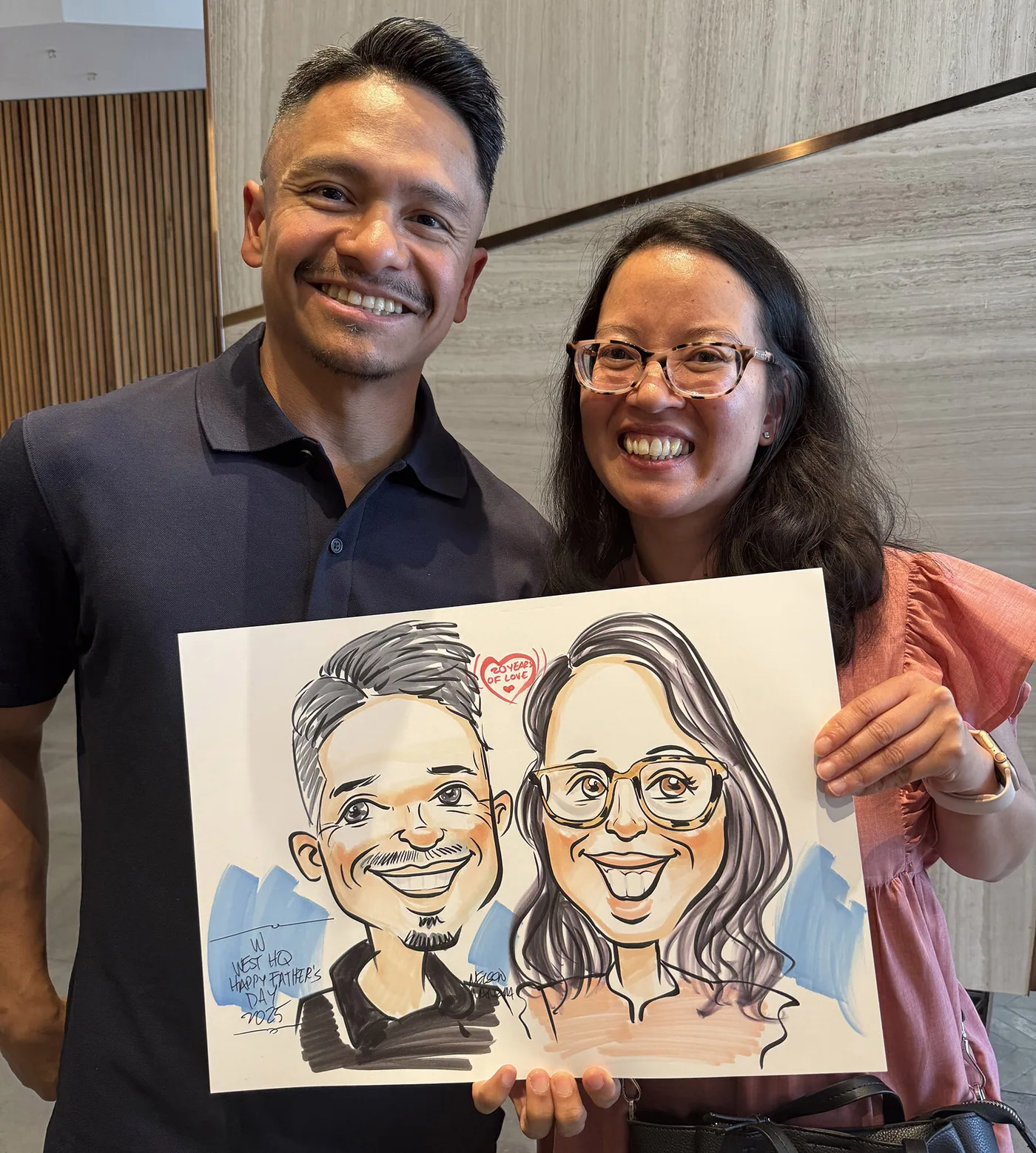 Person holding a hand-drawn caricature