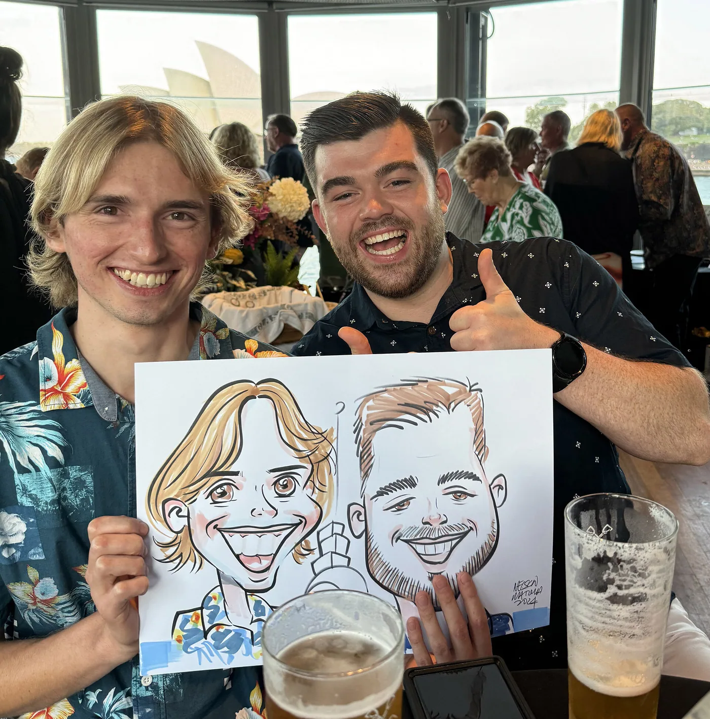 Person holding a hand-drawn caricature